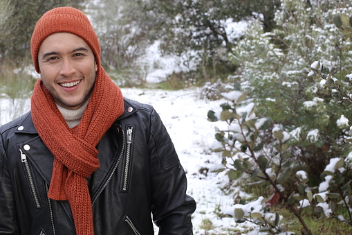 Fashionable ethnic young man in the winter.