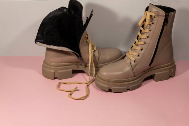 istock a pair of women's light, leather winter boots 1297204462