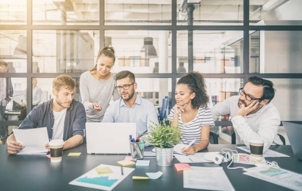 istock Young creative business people meeting at office. 1297205500