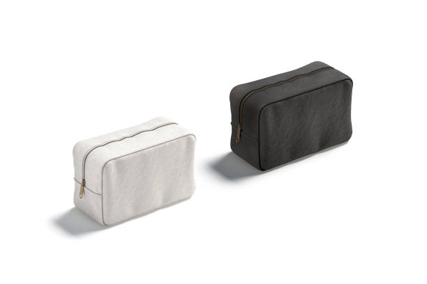 istock Blank black and white canvas cosmetic bag mockup, side view 1297205559