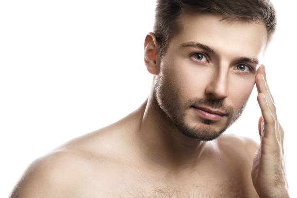istock Young and handsome man with smooth skin on white background 1297205874
