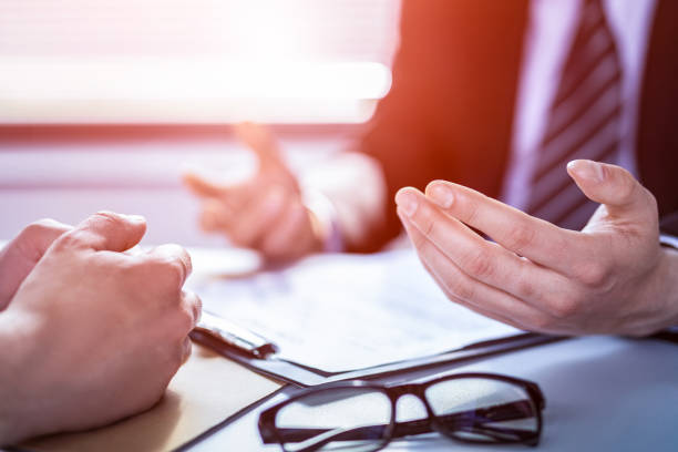 istock Business people negotiating a contract. 1297206766