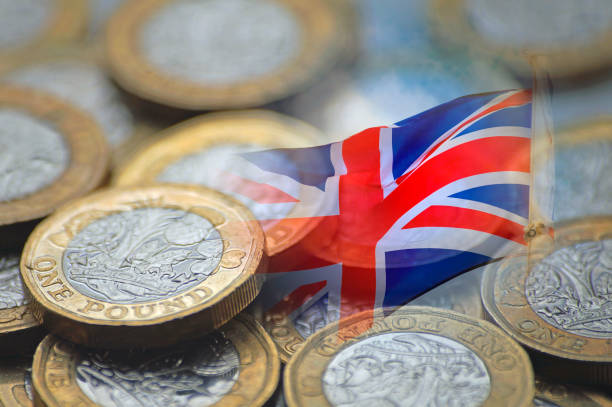 istock UK flag and pound coins 1297208058