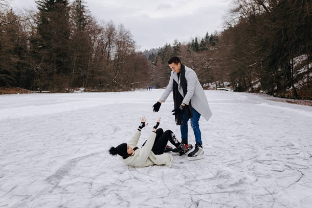 istock Man trying to pick up her girlfriend. 1297208238