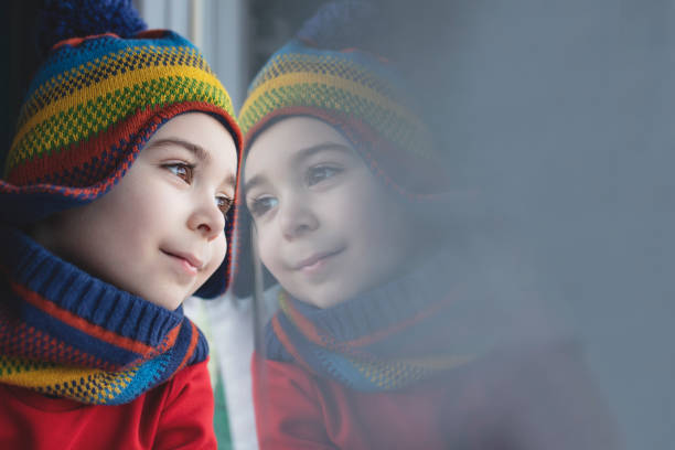 Portrait of a little girl in warm clothes- White background