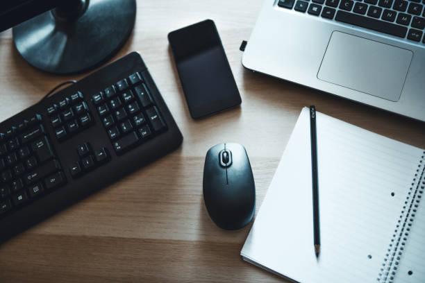 istock Office Equipment - Mouse, Laptop, Keyboard, Smartphone, Pencil And A Notebook 1297211452