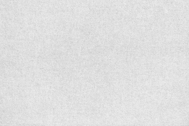 istock White cotton fabric texture background, fabric cloth pattern from natural textile 1297211877