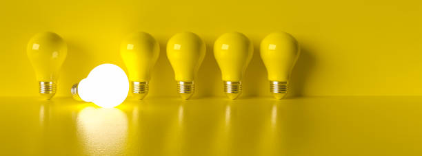 istock power on Idea light bulb on a vivid yellow background concept for ideas or innovation or saving energy 1297211920