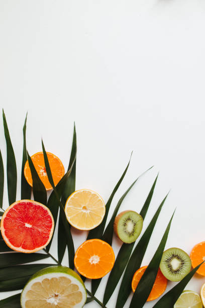 istock Summertime tropical background with exotic fruits 1297213339