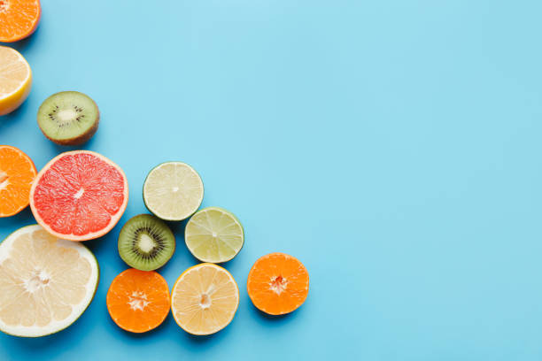 istock Summertime tropical background with exotic fruits 1297213354