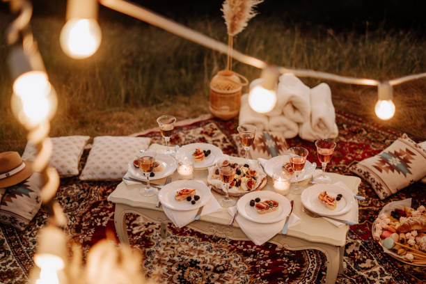 istock Served Picnic Table with Tasty Desserts and Drinks 1297214275