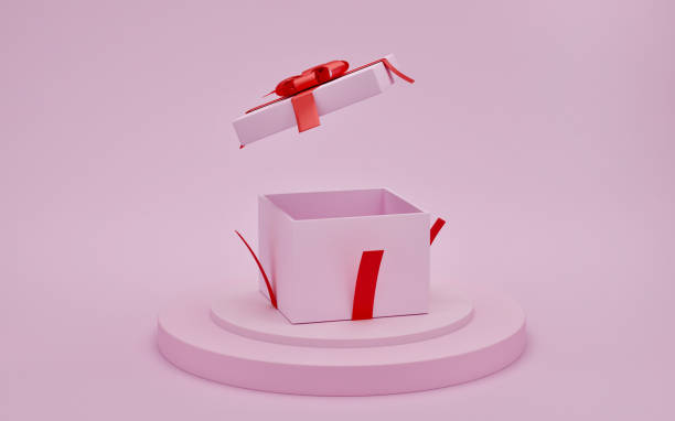 istock Open gift box with red ribbon on presentation podium with pink color background 1297214384