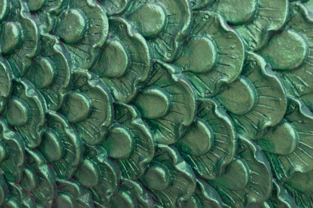 close up view of abstract green scale stone pillar background or texture