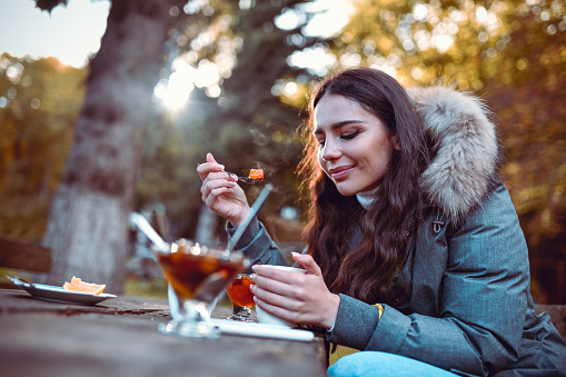 Female Beauty Eating Fruit Honey Dessert With Her Tea While Relaxing In Forest