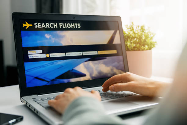 online booking - person using internet website in laptop for flight search and reservation - airplane ticket ticket airplane internet imagens e fotografias de stock