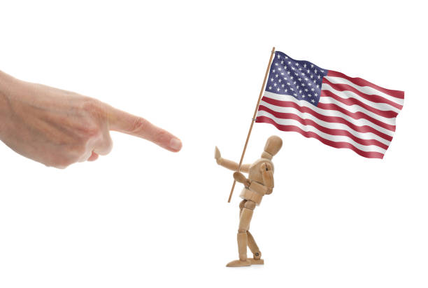 istock Wooden mannequin hold american flag and rejects interference 1297218866