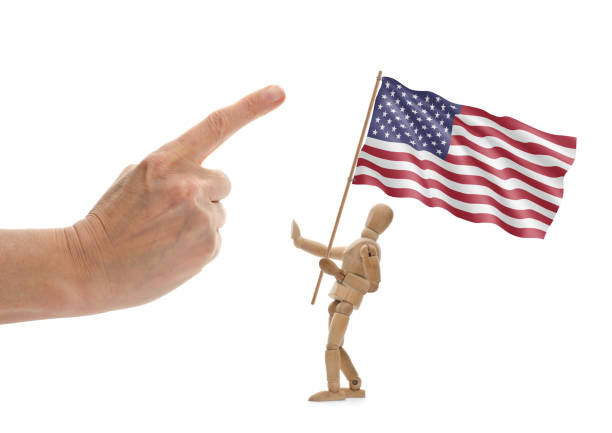 istock Wooden mannequin hold american flag and rejects interference 1297218882