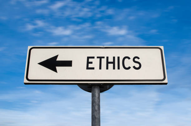 istock Ethics road sign, arrow on blue sky background. One way blank road sign with copy space 1297220573