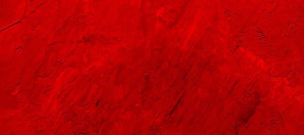 istock Fragment of red plastered wall as background or texture 1297220661