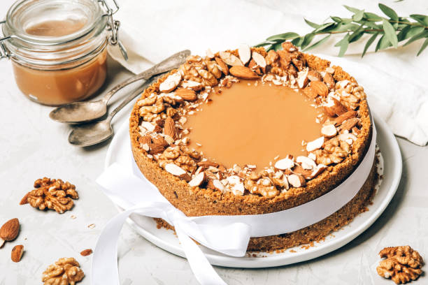 istock Cheesecake with salted caramel and nuts. 1297227038
