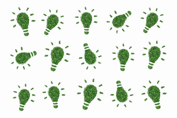 istock Pattern of light bulbs grass and leaves are green 1297227838