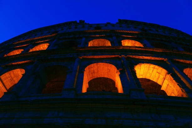 The Colosseum, or Coliseum, in Rome, Italy is always an architectural wonder to behold, and pictured here is a perfect example of the amazing design that still stands today.  Construction started in 72 A.D. by Vespasian, with modifications added by Titus and Domician, the three Roman Emperors from the Flavian dynasty - hence the structure is also known as the Flavian Amphitheater.  Holding up to 80,000 people, the Colosseum was used for gladiator fights, to showcase the Navy with battleships in water, animal hunts, and in later years as apartments. This iconic structure still stands, despite repurposing much of the marble and stone for buildings across Rome.  Today it is one of the most visited tourist attractions in the city.