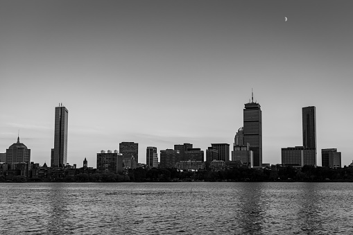 The moon over the Boston cityscape