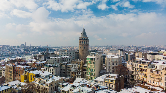 Istanbul, Turkey - November 25, 2021: View of the Galata Bridge from the high part of the city. Domes of the Suleymaniye Mosque.