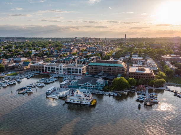 Alexandria, Virginia at Sunset Aerial view of the waterfront at Old Town Alexandria, Virginia at sunset, featuring the Cherry Blossom paddlewheel boat historic district stock pictures, royalty-free photos & images