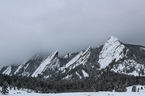 Boulder, Colorado's iconic Flatirons on a snowy day