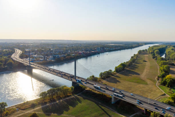 traffic on modern bridge over Rhine river at late sunny afternoon