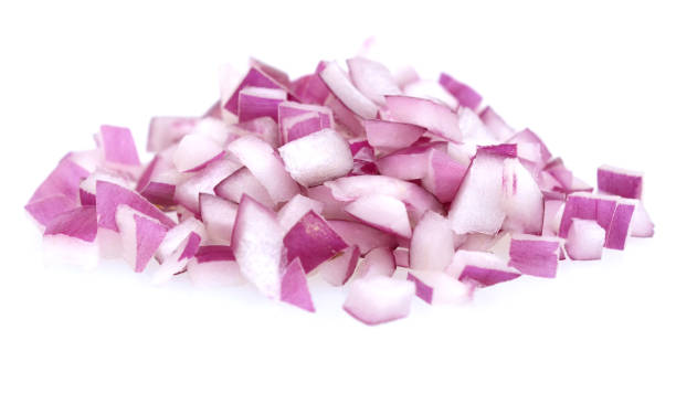 Red onion chopped over white background stock photo