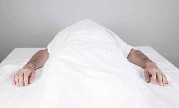 istock A dead man is lying in the morgue. 1297239698
