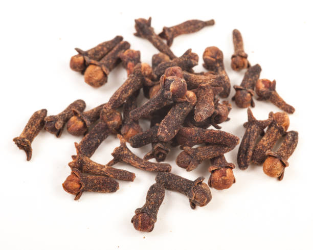 istock dry cloves on white background 1297241403