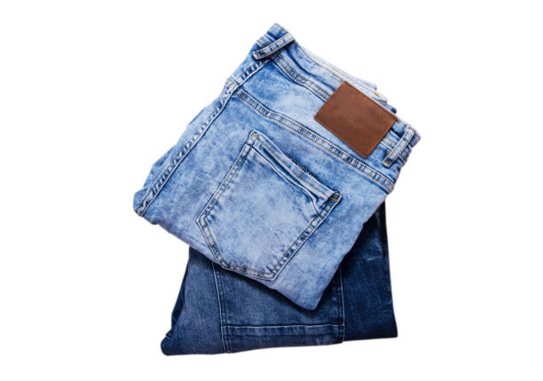 istock Folded denim, Blue and dark blue jeans on white background set or collage 1297243096