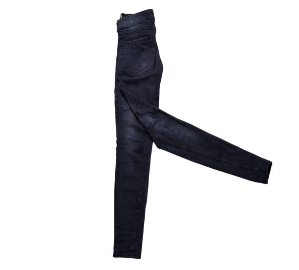 Black slim denim isolated over white, black jeans close up