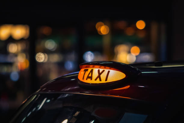 istock London black cab taxi sign 1297243725