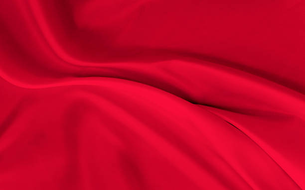 istock Black red satin dark fabric texture luxurious shiny that is abstract silk cloth background with patterns soft waves blur beautiful. 1297248035