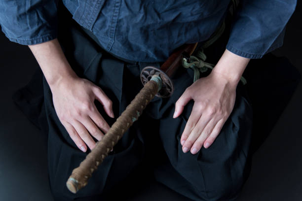 istock Seated man and his sword 1297248072