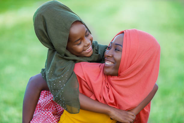 istock Loving Emotions Between Muslim Mother and Daughter. 1297248899