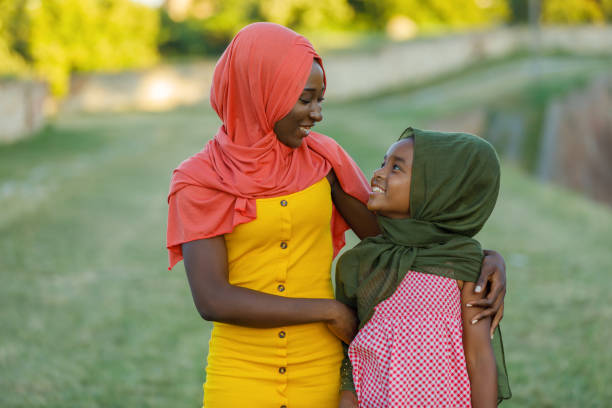 istock Loving Emotions Between Muslim Mother and Daughter. 1297249639
