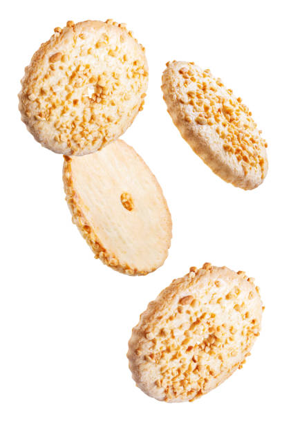 istock Shortbread cookies with peanuts on a white isolated background 1297251247