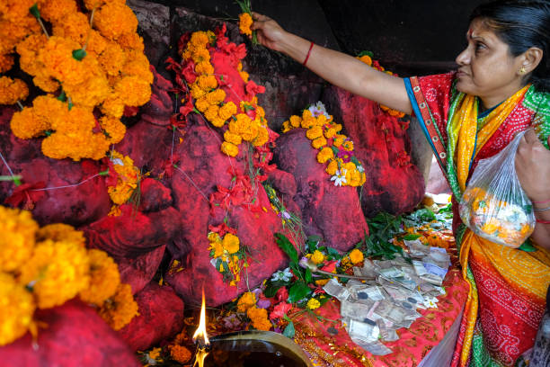 athmandu, Nepal - November 3, 2013: Nepalese people make Garland for sale at Thamel market in Kathmandu Nepal.