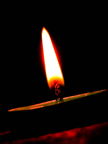 istock The candle symbolizes light in the darkness ... 1297255131
