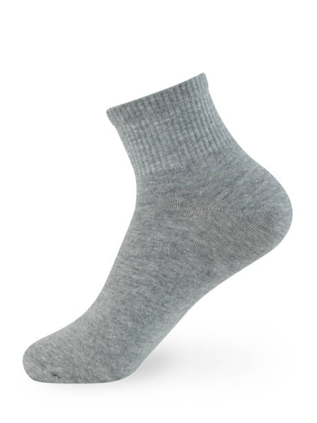 istock Isolated gray sock on invisible mannequin foot on white background, side view 1297255376