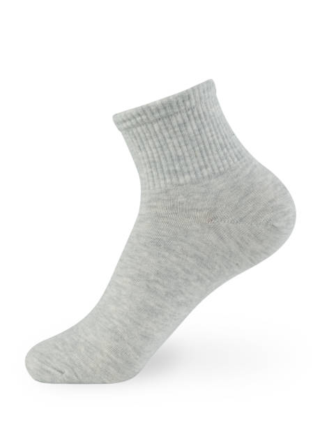 istock Isolated gray sock on invisible mannequin foot on white background, side view 1297255440