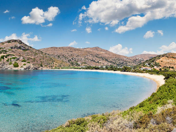 The bay of Fellos in Andros island, Greece The circular bay of Fellos beach in Andros island, Greece andros island stock pictures, royalty-free photos & images