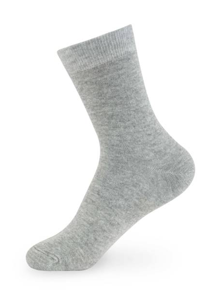 istock Isolated long gray sock on invisible mannequin foot on white background, side view 1297257783