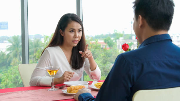 istock Happy romantic couple eating lunch at restaurant 1297258834