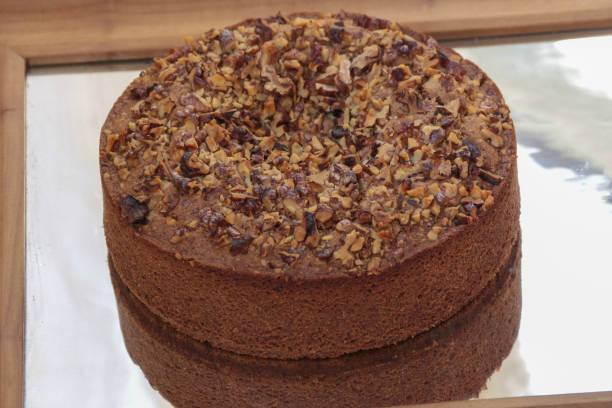 istock close up of delicious nuts cake reflected on a mirror 1297259945